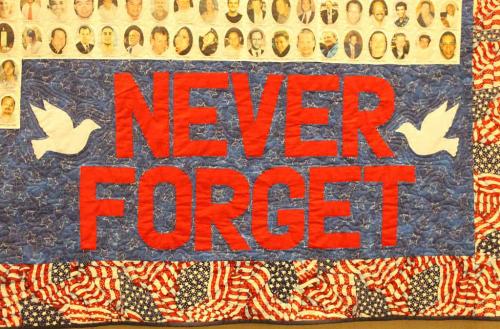 Never Forget  tapestry at 911 Memorial in NYC