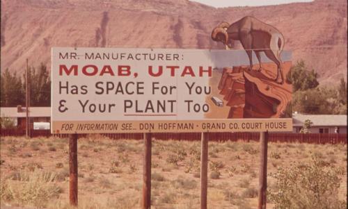 County-sponsored sign promoting manufacturing in Moab during the early 1970s